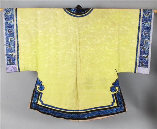 A Chinese yellow brocade jacket,